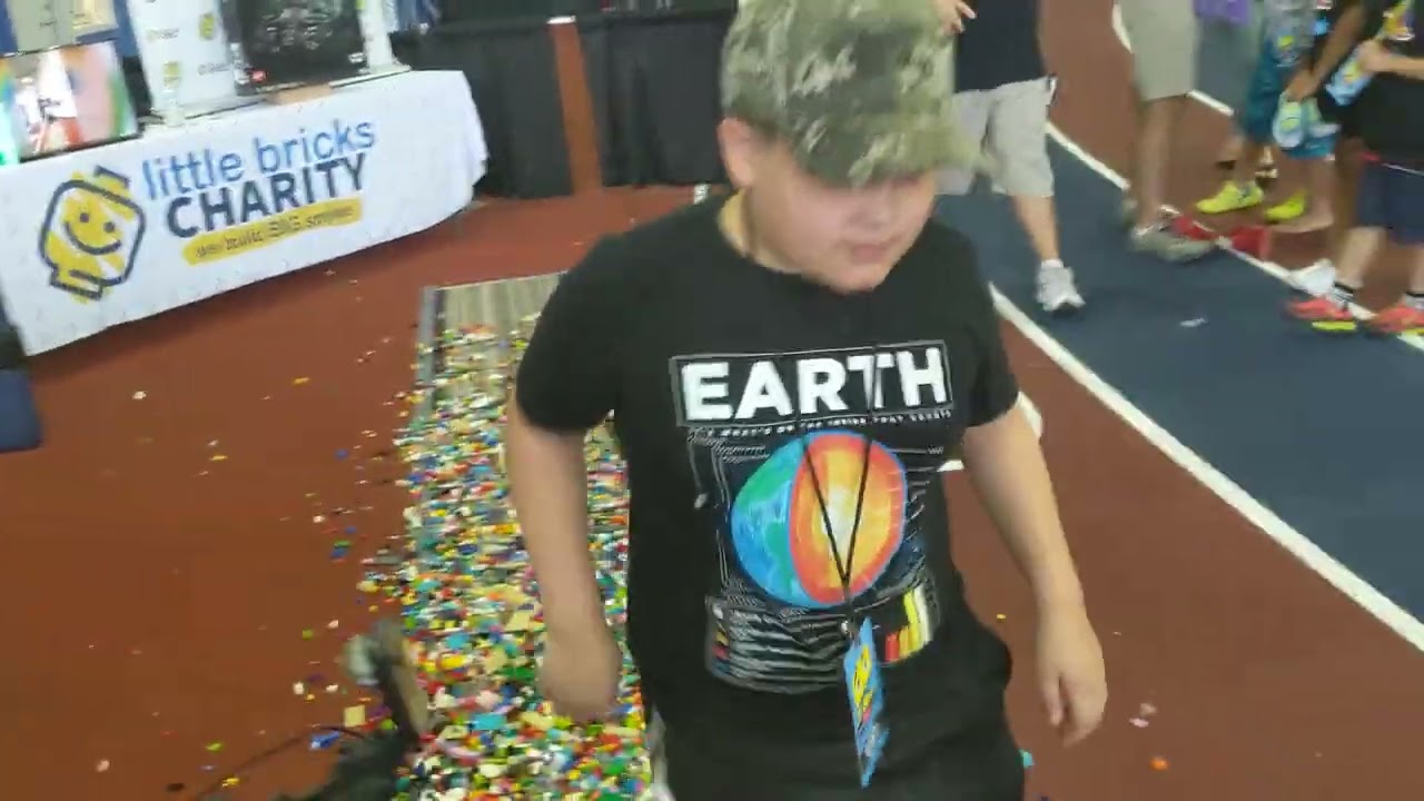 Asher Walks Barefoot On LEGO, For Charity!