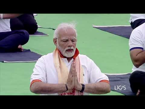 Indian Prime Minister Narendra Modi takes part in Yoga Day from Karnataka's Mysore Palace