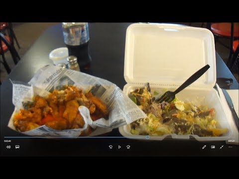 Jim & Sue's Steak Salad & Buffalo Wings (also includes a history of the building)