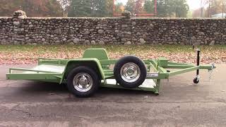 Two place ramp free motorcycle trailer