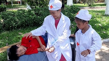 Win Tin | bác sĩ chữa bệnh cho em bé bị ngất xỉu do say nắng | bac si tiem em be