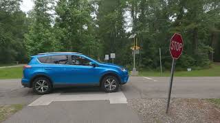 Tammany Trace and Lacombe Trailhead with bridge.