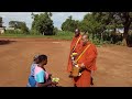 For first time, alms round of Buddhist monks in Uganda, Africa.