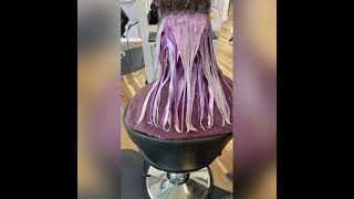Amazing underneath purple hair color great haircut