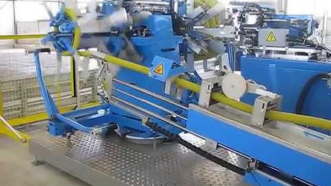 Automatic hose pipe coiler and coiling strapping machine