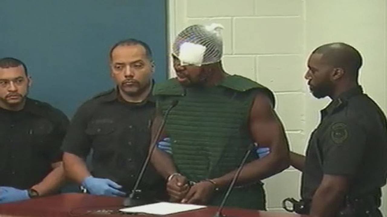 Man accused of killing Orlando police officer defiant in court - YouTube