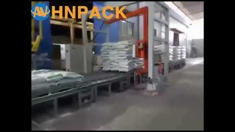Hennopack rotary arm pallet stretch wrapper for Titanium powder bag stretch film wrapping