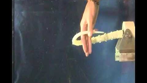 Octopus-like Robotic Arm grasping Human Hand.avi