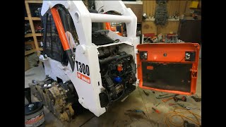 Installing the engine in a bobcat skid steer