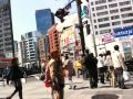 Japanese Girls yelling promoting stuff on the streets of Tokyo, Japan