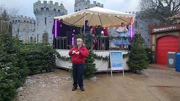 Legoland Windsor, Christmas Carolers singing Last Christmas with BSL interpreter.