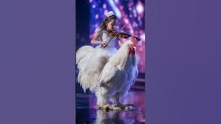 A magician girl plays Canon in D major on AGT stage.