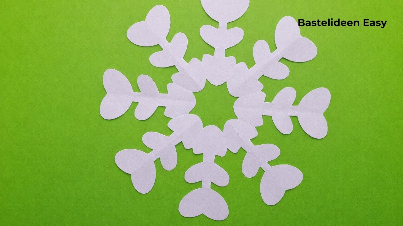 Wie man eine herzförmige Schneeflocke bastelt - Basteln Mit Papier