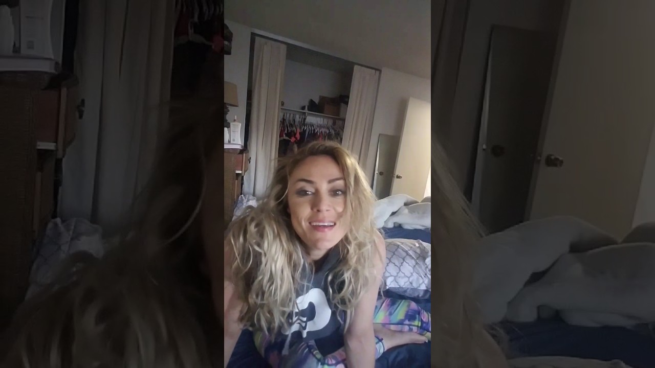 Tiphany makes the bed while live