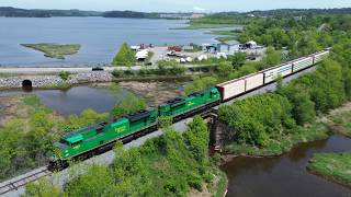 Awesome Aerial 4K View! Long Manifest / Stack Train NBSR 121 passing South Bay, NB