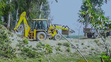 Jcb Backhoe Loader Loading Mud on Tractor - Backhoe Loading Solid Mud On Tractor