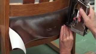 This video details the upholstery of a Mission Style oak rocker from start to finish. Learn how to tie down springs, use wood wool for 