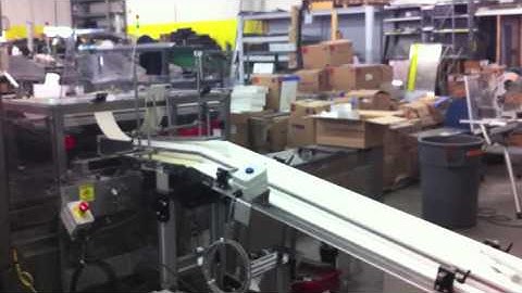 Econocorp Pegasus Horizontal Cartoner with Rotary Drop & Bucket Conveyor