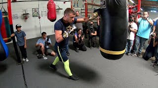 VASYL LOMACHENKO WORKING THE HEAVYBAG WITH BODY SHOT COMBINATIONS AHEAD OF JORGE LINARES FIGHT