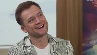 Martin Bester interviews Rocketman's Taron Egerton and Dexter Fletcher in France Net Worth