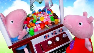 ¡Auxilio... a George lo ha atrapado la maquina de dulces! Juguetes de Peppa Pig. Vídeos para niños.