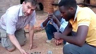 Macadamia shell cookstove producing high quality biochar