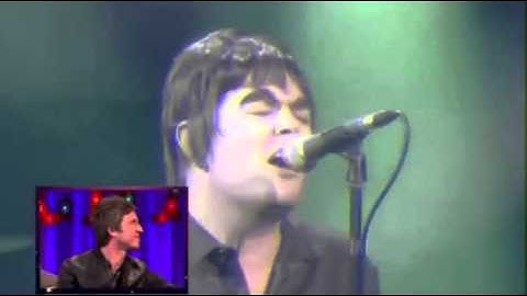 Alan Carr singing Some Might Say by Oasis on TOTP
