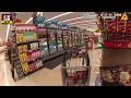 Man Climbs On Fridges At Grocery Store And Shoots At Police