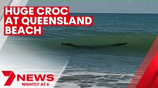 Crocodile spotted swimming at Central Queensland beach | 7NEWS screenshot 5