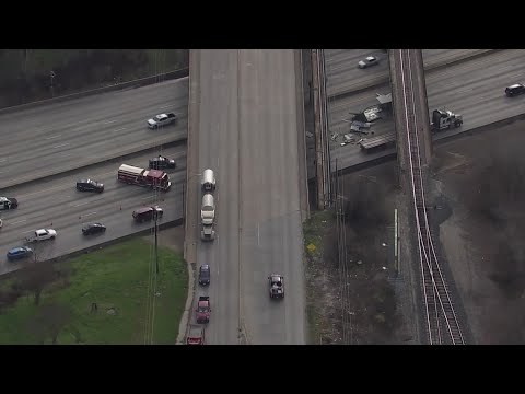 Big Rig Ripper Clinton Road Big rig hits overpass on East loop at Clinton Drive, stalling traffic ...