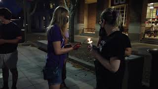 Candlelight vigil unites activists, students and survivors