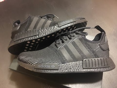 nmd triple black reflective