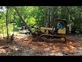 Pushing over some trees with the John Deere 450 Bulldozer