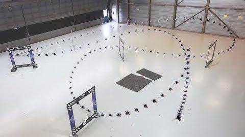 A Comparative Study of NMPC and Differential Flatness Control for Quadrotor Agile Flight (TRO 2022)