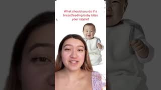 What should you do if a breastfeeding baby bites your nipple?
