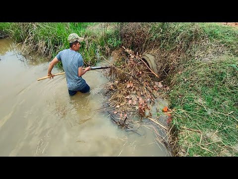 Removing Trash And Debris Flow Clogged Culvert Drain