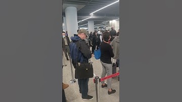 Thumbnail of long queue for passport control at Warsaw airport 🛫