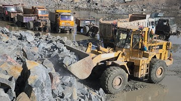 An Incredibly Powerful Wheel Loader: Cat 966E Roaring & Loading Rocks in Mountains