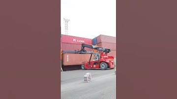 Kalmar Reach stacker with a tilting spreader for container handling