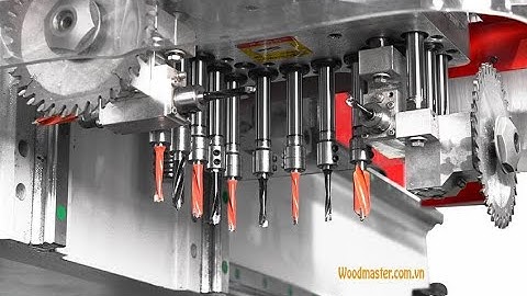 MÁY CNC TRUNG TÂM 2.5d WOODMASTER  Thay dao tự động khoan 5 mặt và có trục lưỡi cưa cắt mồi