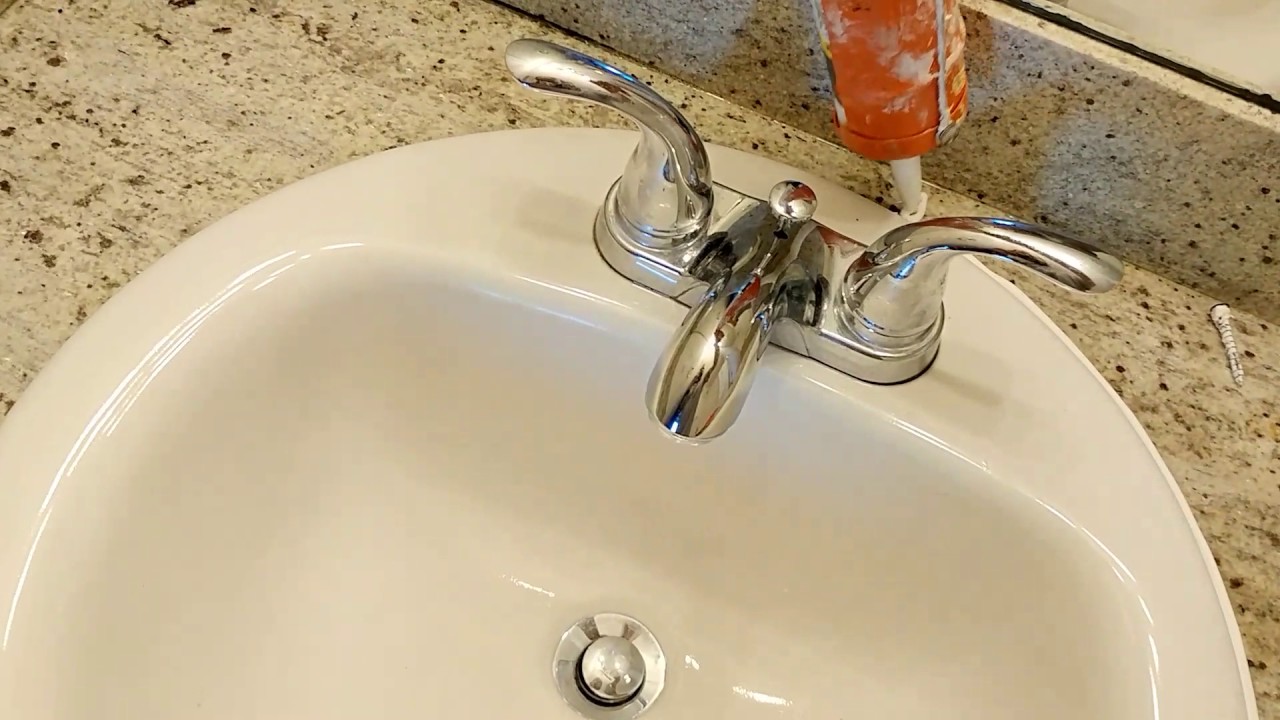 caulk around bathroom sink faucet