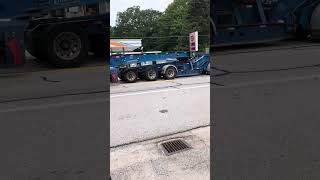 He said, dammit boy! Twice, 50 wheel triple axle semi tractor trailer transport lowboy