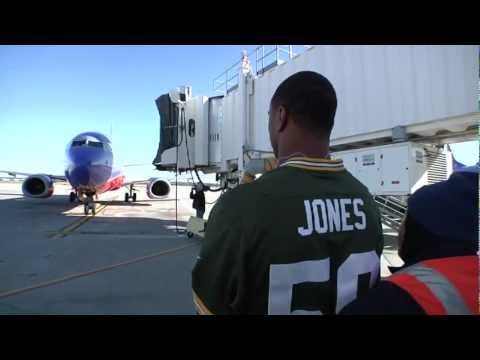 Green Bay Packers Jerel Worthy and Brad Jones trade places with Southwest Airlines ramp workers at General Mitchell International Airport in Milwaukee. (Video produced by Southwest Airlines)
