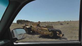 Moving CAT DW15 Scraper