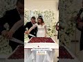 Cutting a gorgeous wedding cake wedding in Dagestan