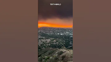 LA Skies Glow Red Amid Raging Wildfires 
