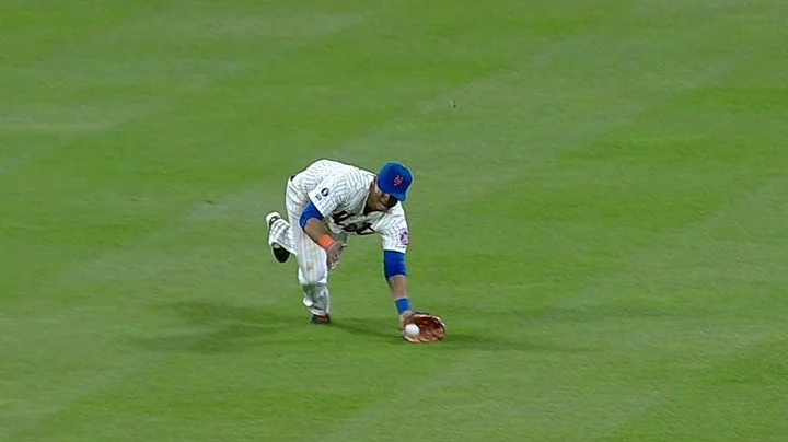 Lagares dives out in center to make the play