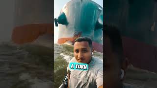 He Was Riding His Boat In Front Of A Container Ship