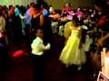 Young  old dancing together to oldies at wedding