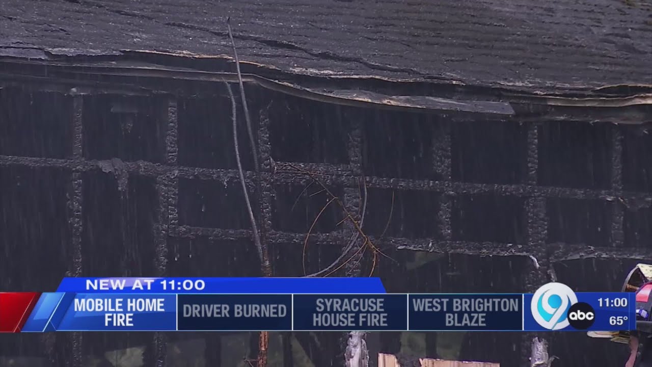 Mobile home catches on fire in Jamesville - YouTube